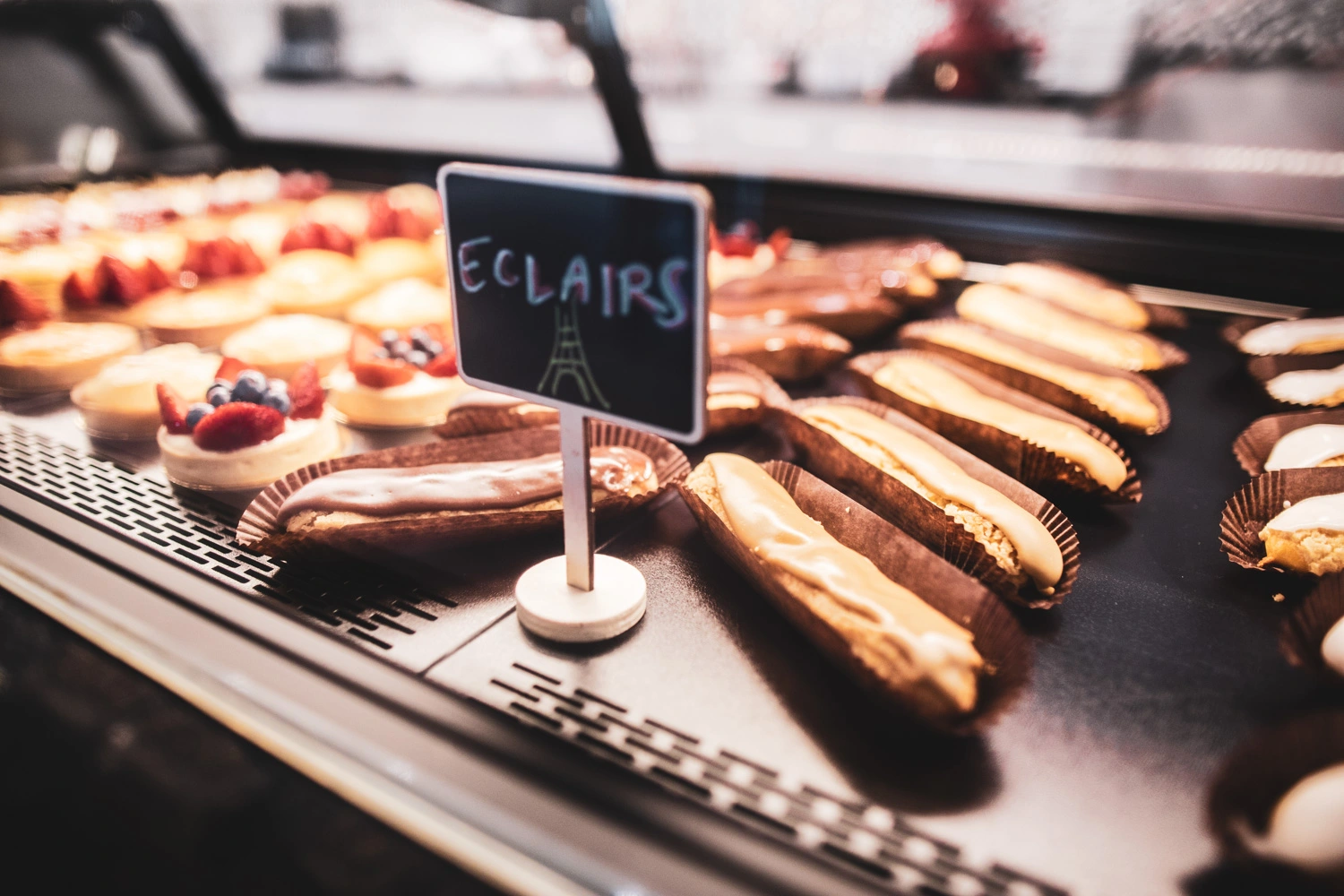 Closeup of eclairs and other French pastries